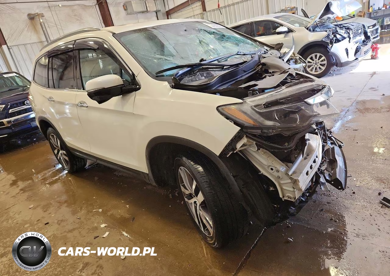 2018 Honda Pilot Touring VIN:5FNYF6H98JB010463 - 4