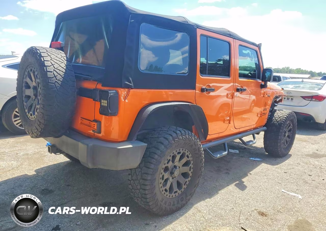 2012 Jeep Wrangler Unlimited Sport VIN:1C4BJWDG0CL269148 - 3