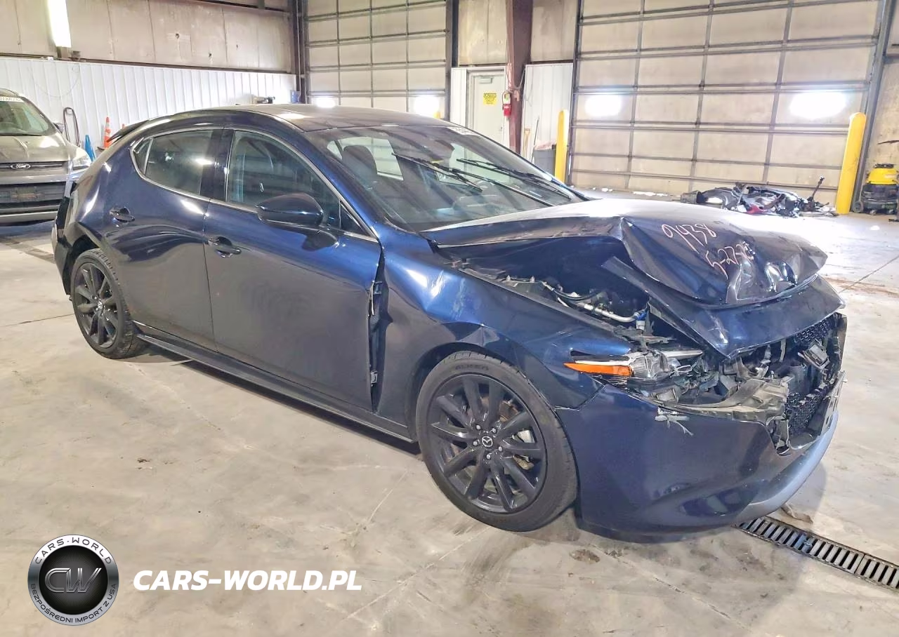 2019 Mazda 3 Premium VIN:JM1BPANM9K1144360 - 4
