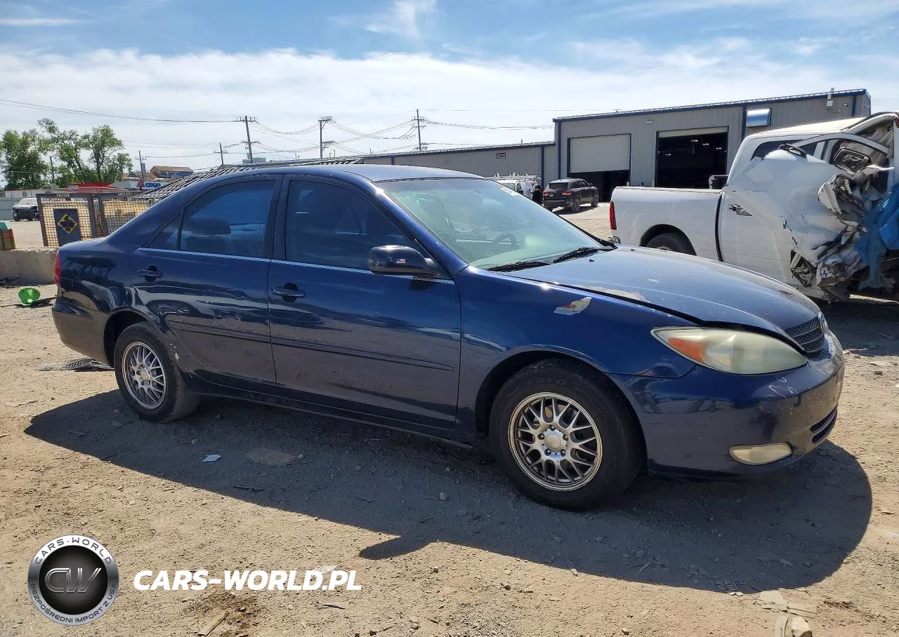 2004 Toyota Camry Le VIN:JTDBE32K440254567 - 4