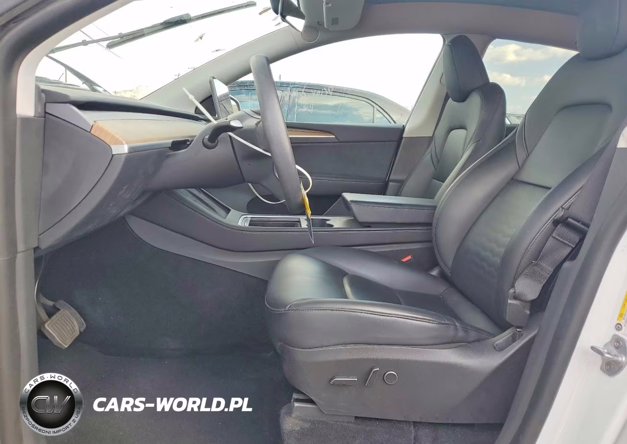 2023 Tesla Model Y VIN:7SAYGDEE3PA030678 - 7