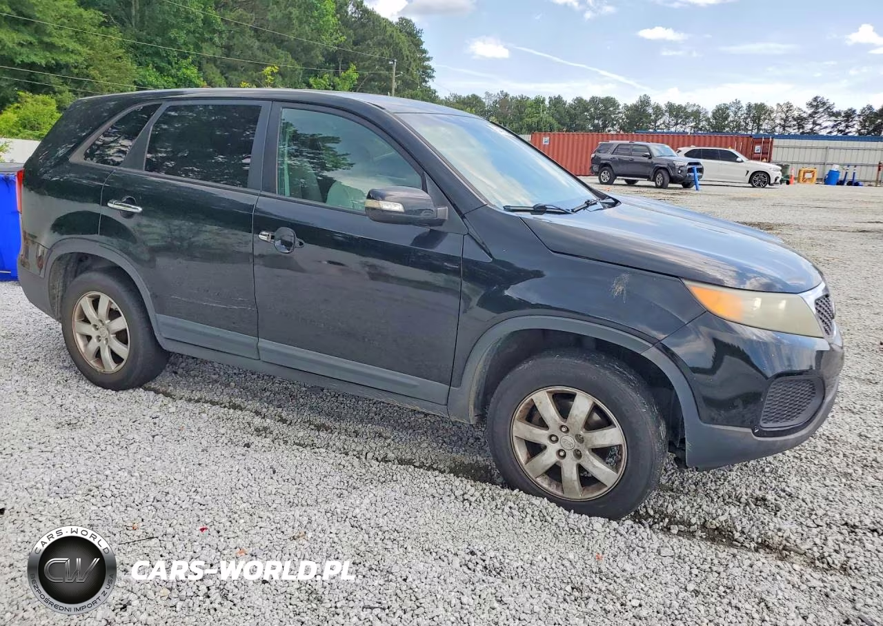 2011 Kia Sorento Lx VIN:5XYKT3A1XBG136027 - 4