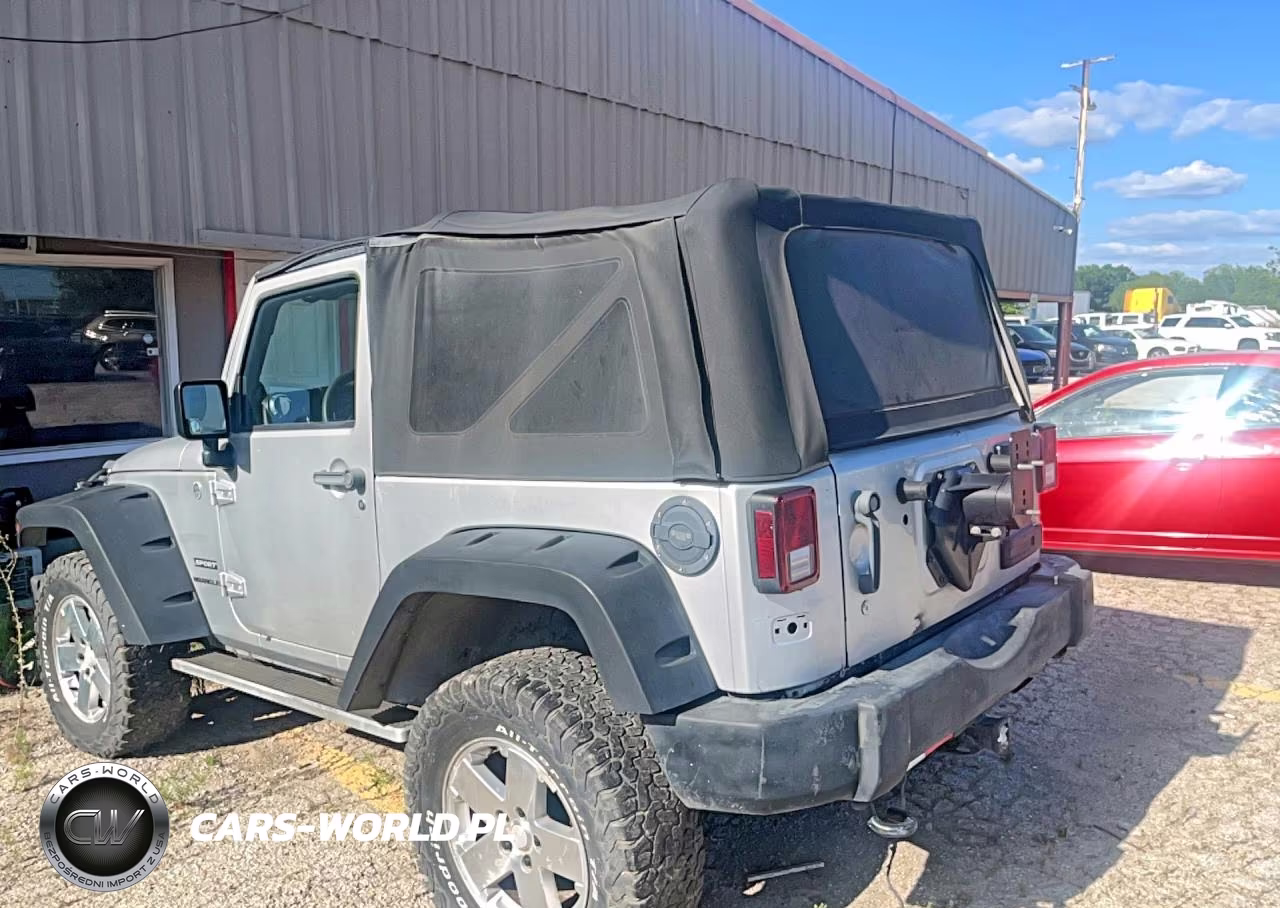 2011 Jeep Wrangler Sport VIN:1J4AA2D16BL551027 - 3