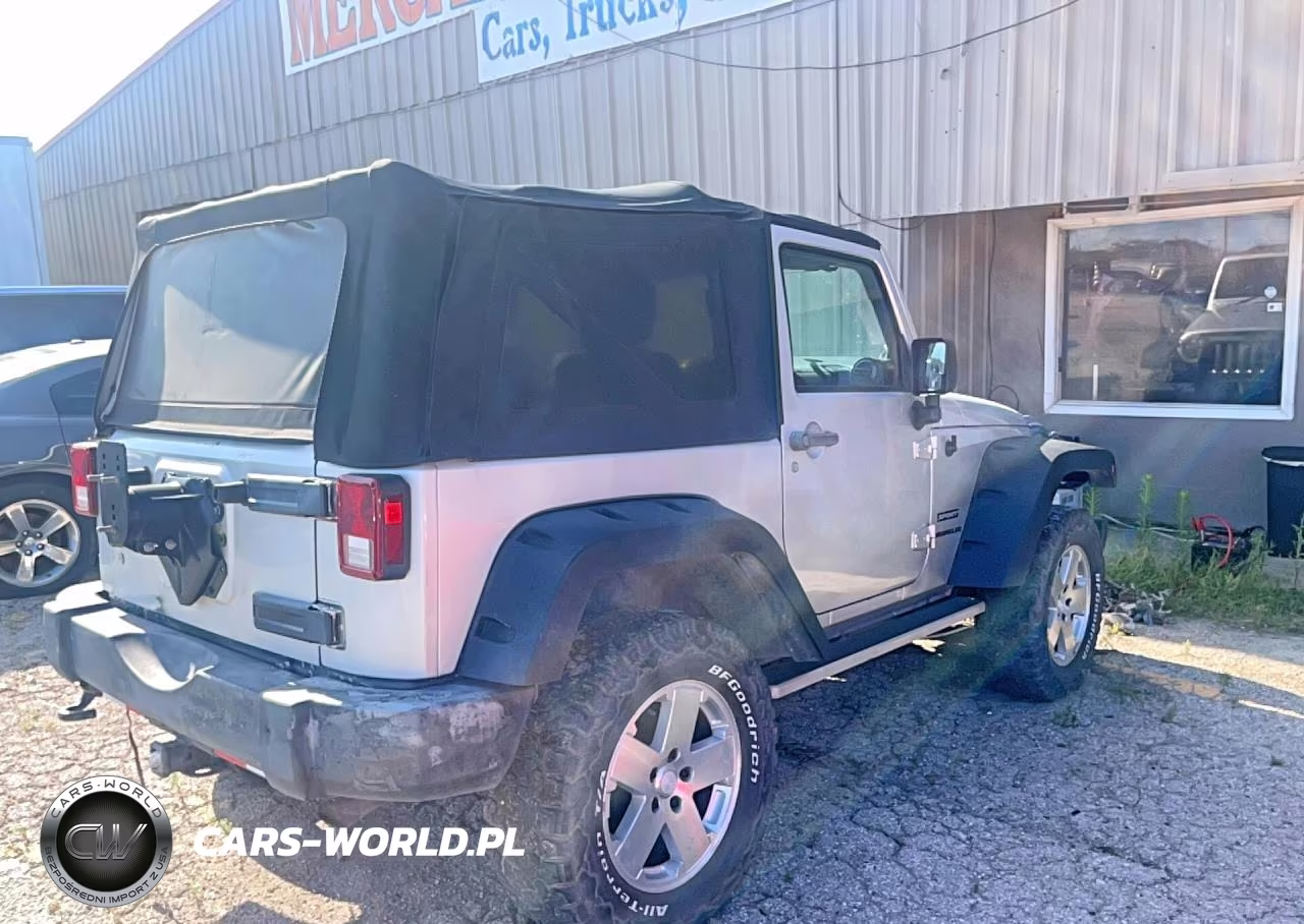 2011 Jeep Wrangler Sport VIN:1J4AA2D16BL551027 - 4