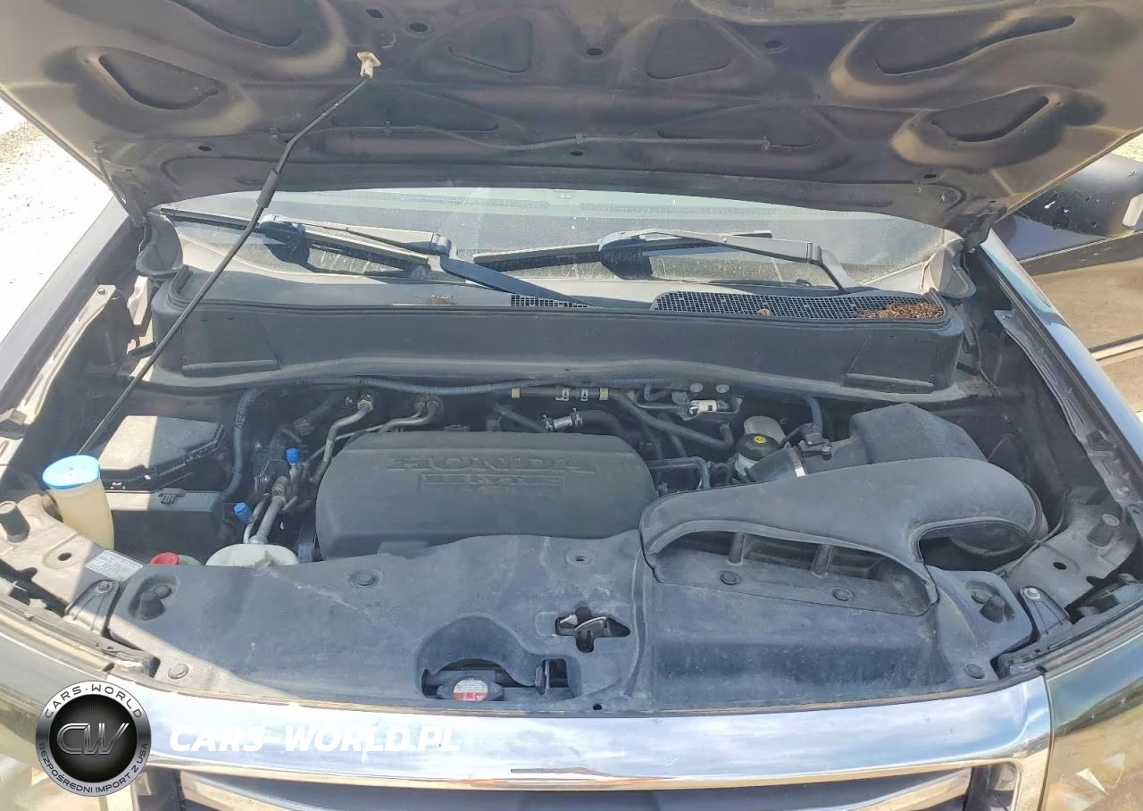 2012 Honda Pilot Touring VIN:5FNYF3H9XCB040534 - 12