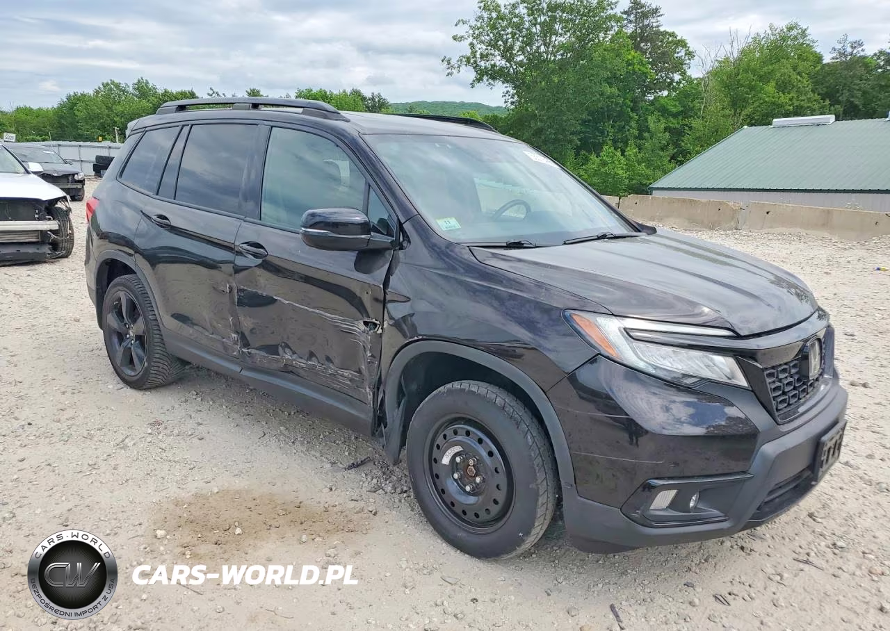 2019 Honda Passport Elite VIN:5FNYF8H02KB014104 - 4