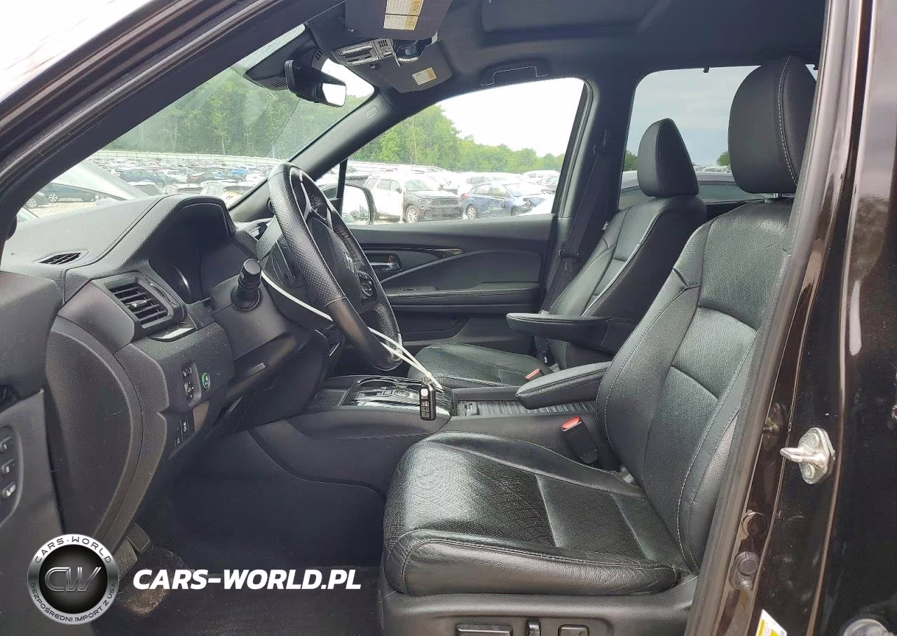 2019 Honda Passport Elite VIN:5FNYF8H02KB014104 - 7