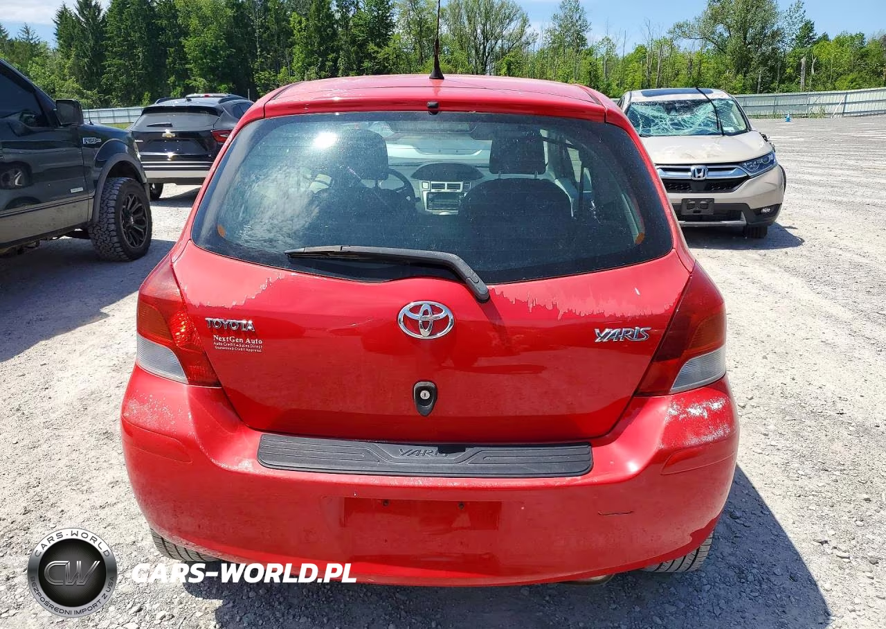 2009 Toyota Yaris Base VIN:JTDJT903X95237122 - 6