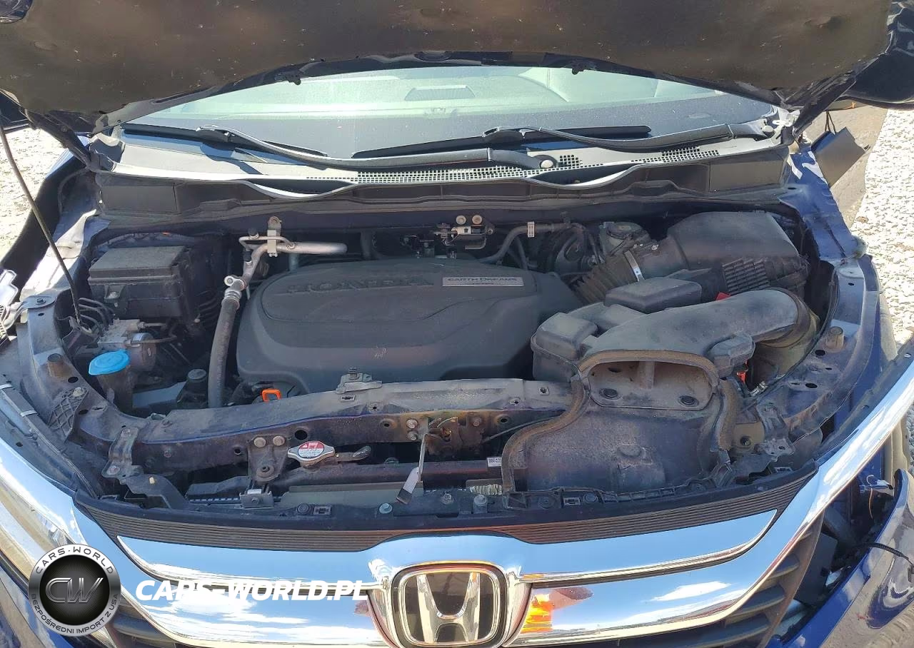 2018 Honda Odyssey Touring VIN:5FNRL6H84JB066940 - 11