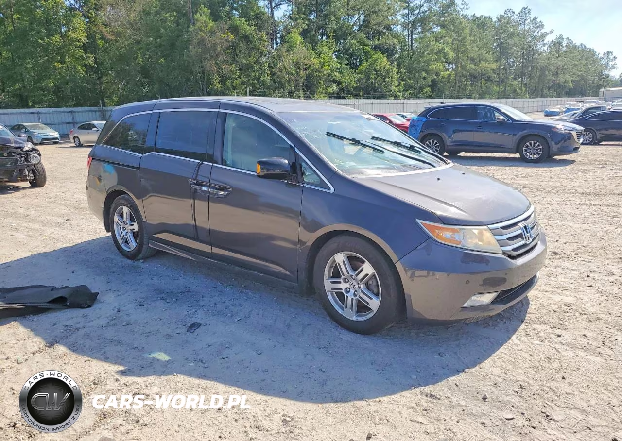 2012 Honda Odyssey Touring VIN:5FNRL5H94CB112143 - 4