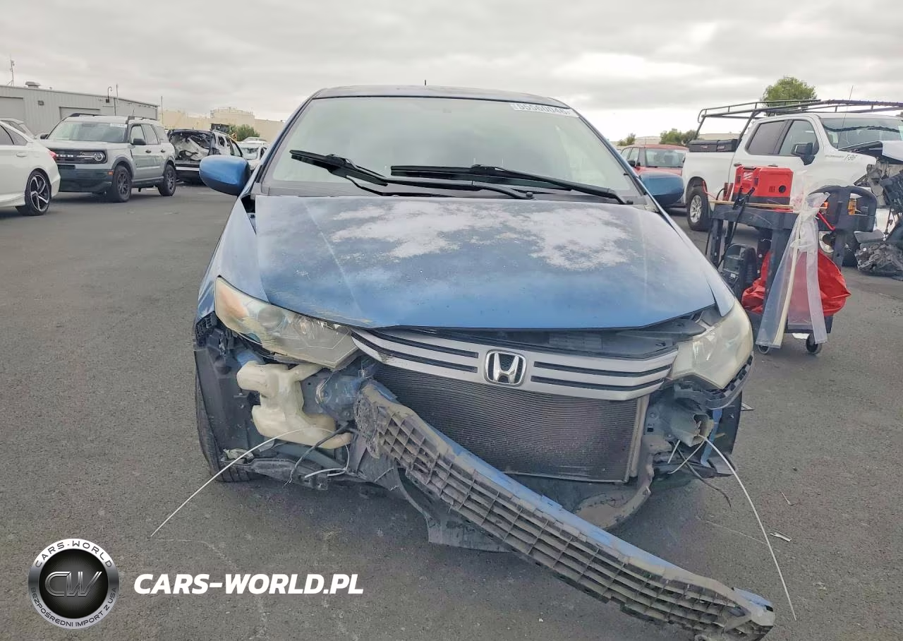 2010 Honda Insight Lx VIN:JHMZE2H57AS031495 - 5