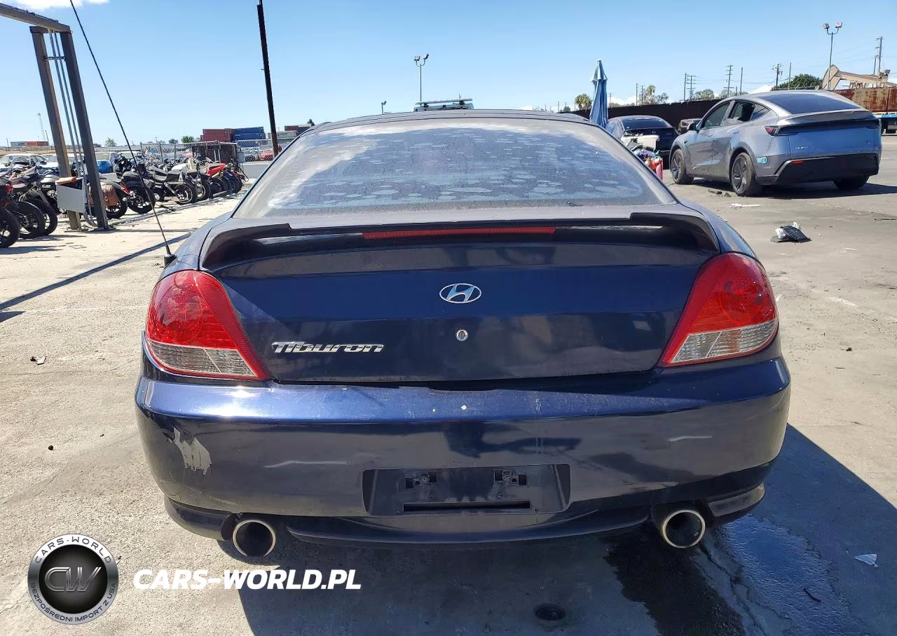 2005 Hyundai Tiburon Gs VIN:KMHHM65D95U157351 - 6