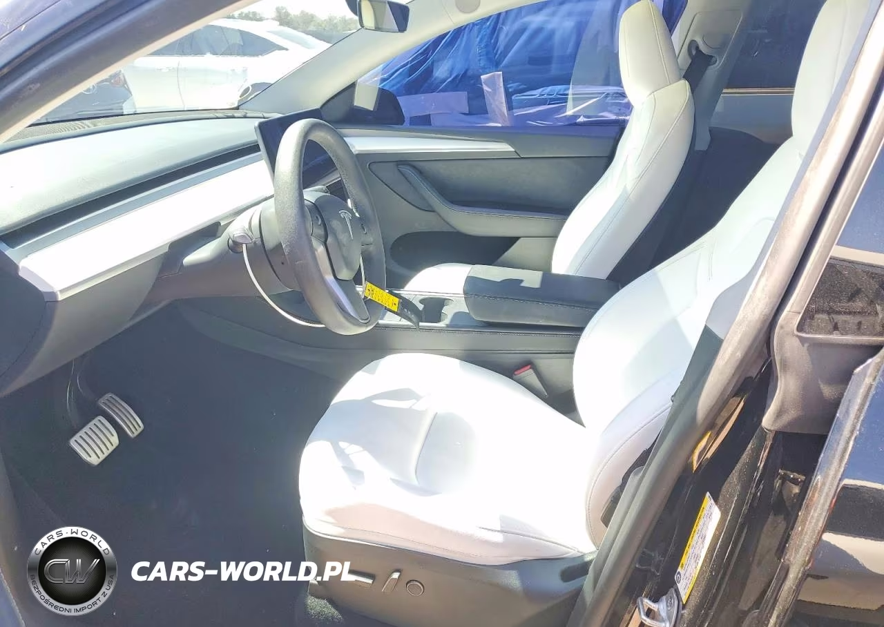 2023 Tesla Model Y VIN:7SAYGDEF7PF899196 - 7
