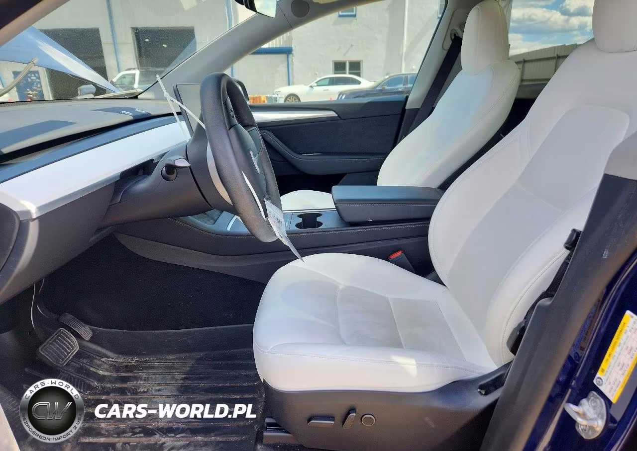 2023 Tesla Model Y VIN:7SAYGDEE4PA171002 - 7
