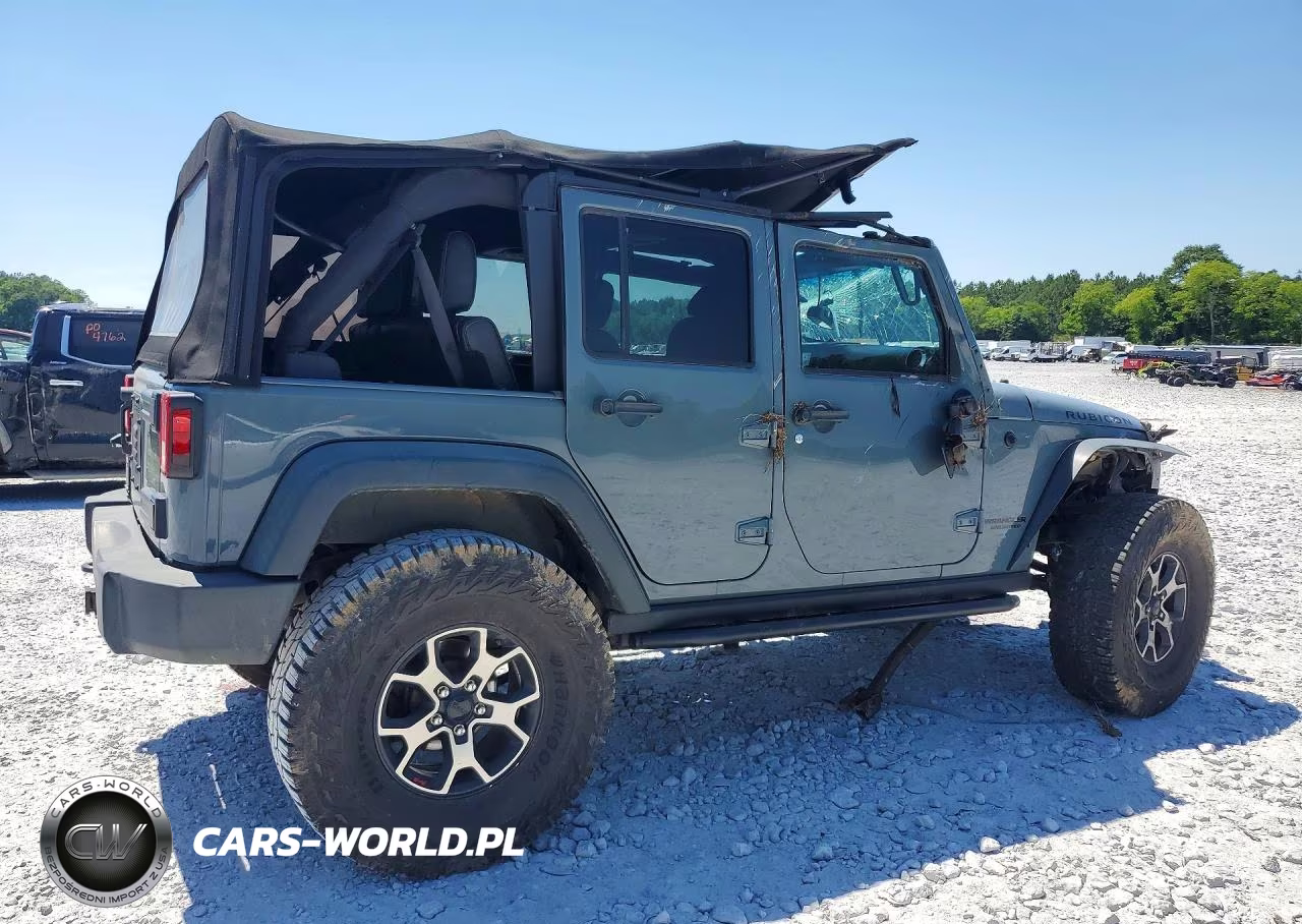 2014 Jeep Wrangler Unlimited Rubicon VIN:1C4HJWFG2EL120962 - 3