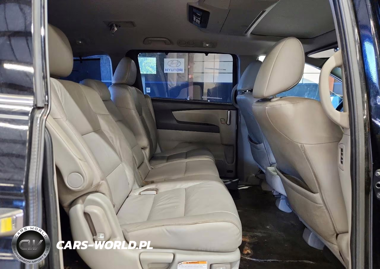 2011 Honda Odyssey Touring VIN:5FNRL5H90BB094738 - 11
