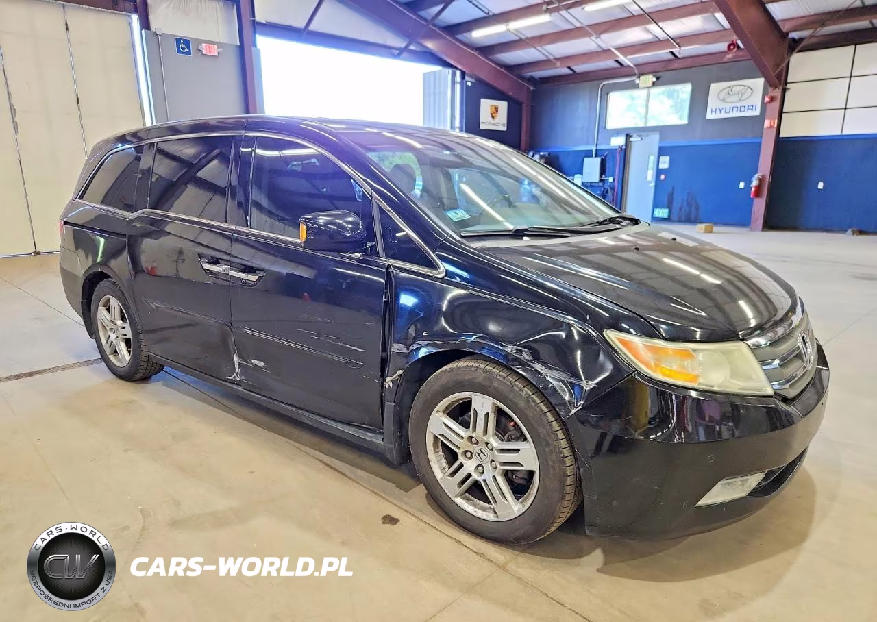 2011 Honda Odyssey Touring VIN:5FNRL5H90BB094738 - 4
