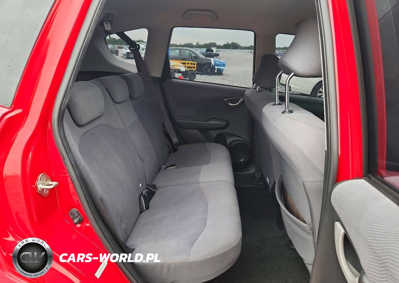 2009 Honda Fit VIN:JHMGE88299S044390 - 10