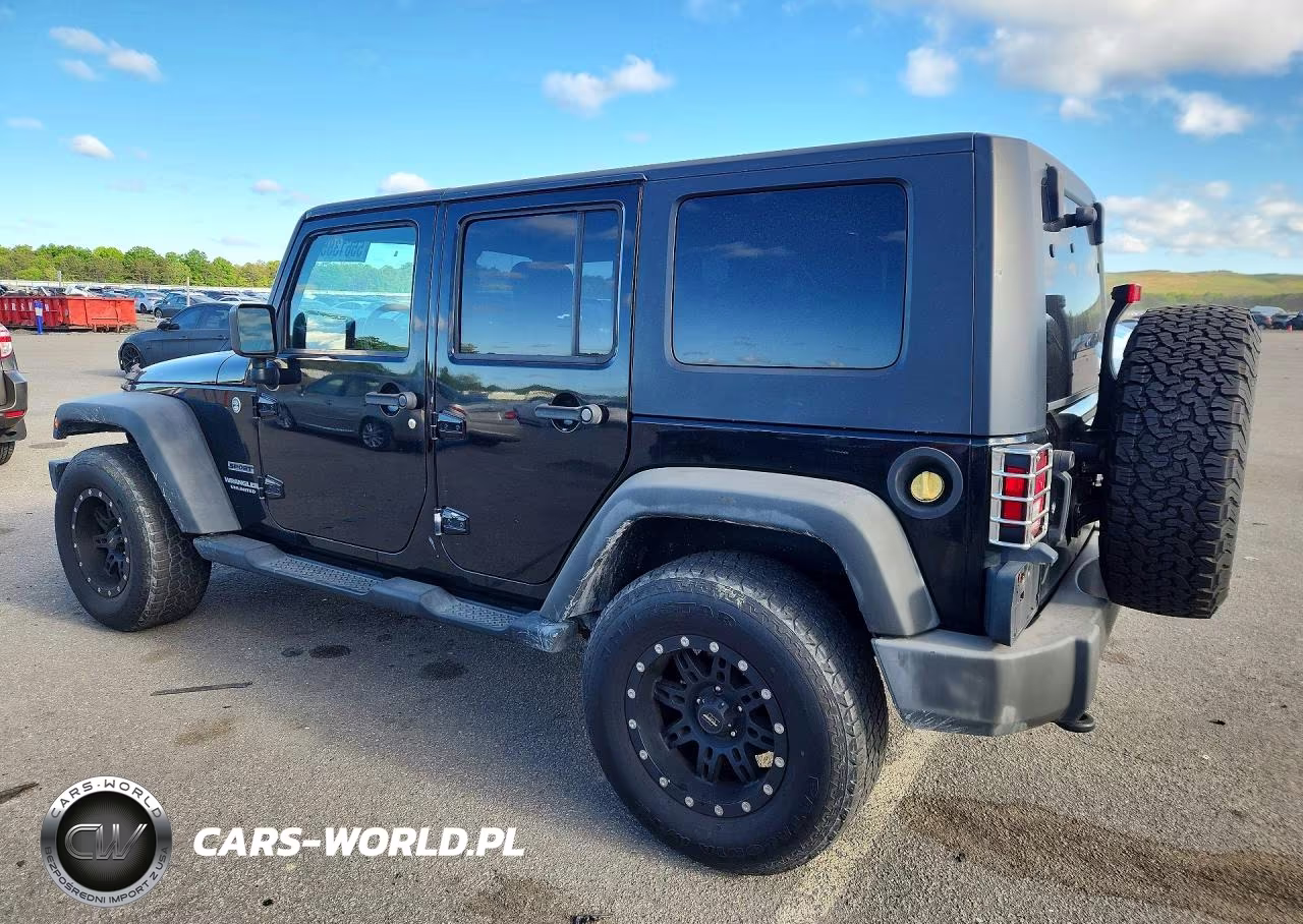 2010 Jeep Wrangler Unlimited Sport VIN:1J4HA3H10AL166558 - 2