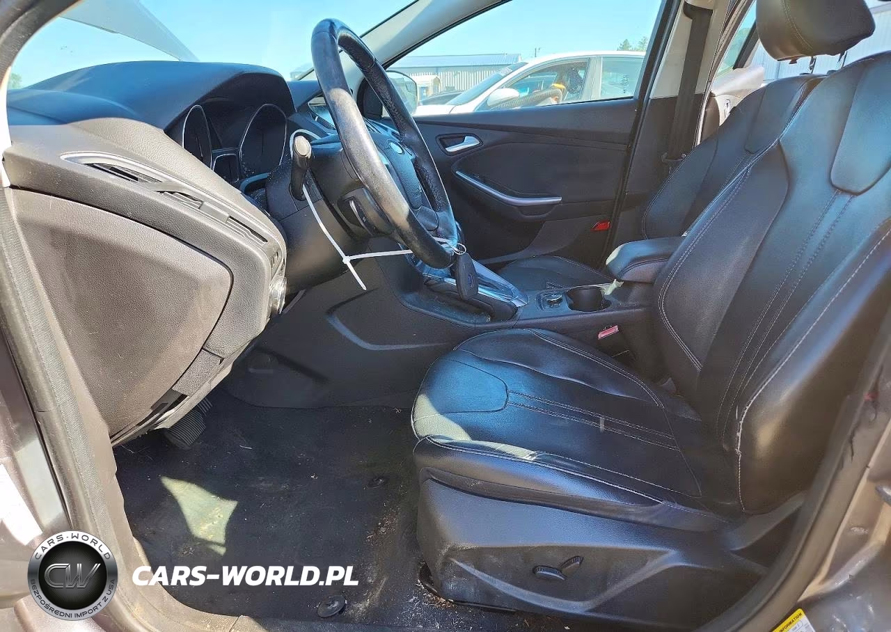 2012 Ford Focus Titanium VIN:1FAHP3N22CL402153 - 7