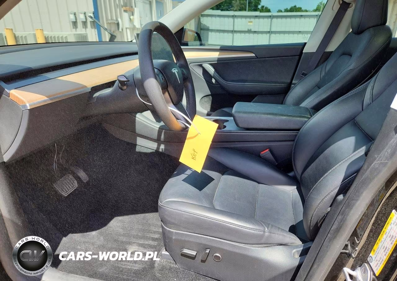 2024 Tesla Model Y VIN:7SAYGDEE1RA215900 - 7