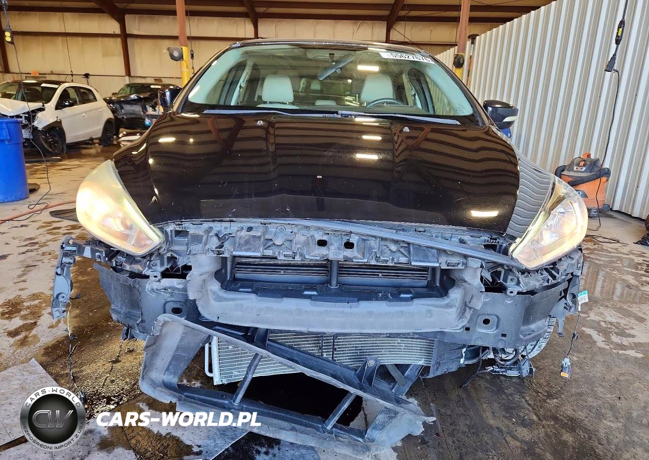 2015 Ford Focus Titanium VIN:1FADP3N27FL208754 - 5
