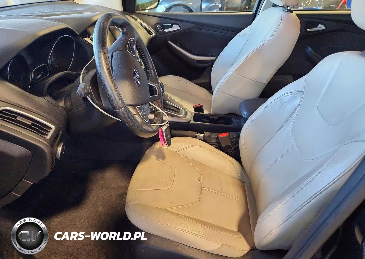 2015 Ford Focus Titanium VIN:1FADP3N27FL208754 - 7