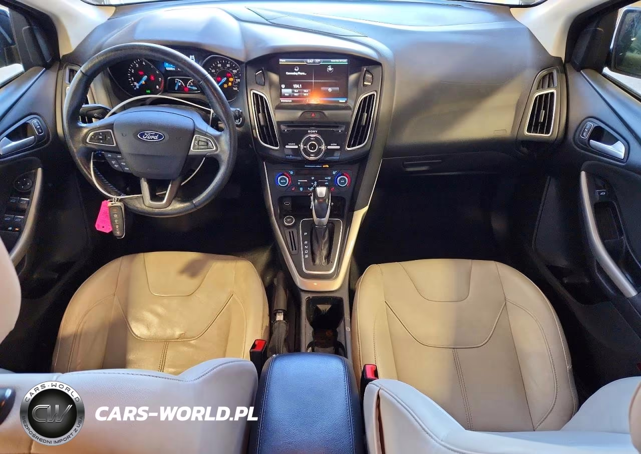 2015 Ford Focus Titanium VIN:1FADP3N27FL208754 - 8