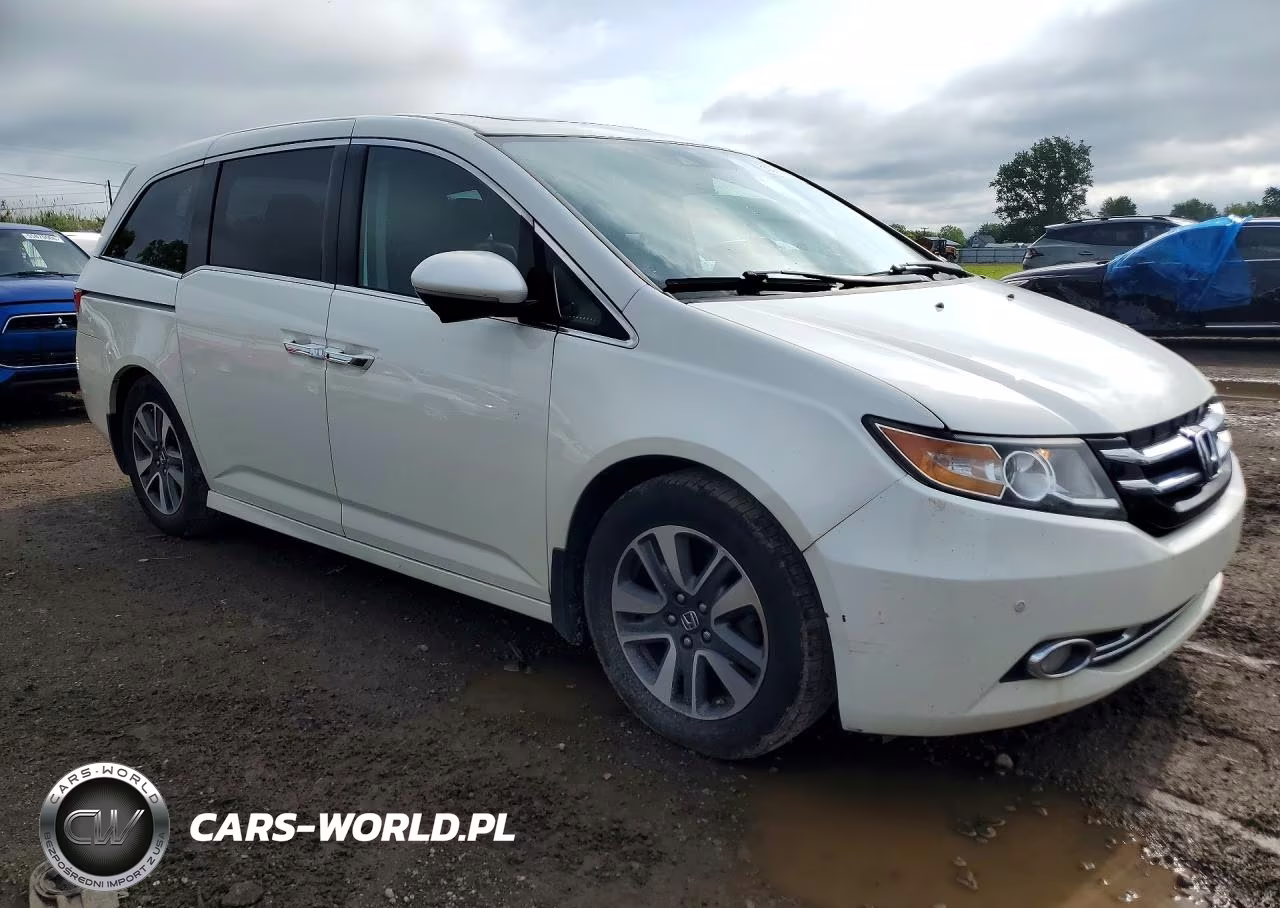 2016 Honda Odyssey Touring VIN:5FNRL5H9XGB154998 - 4