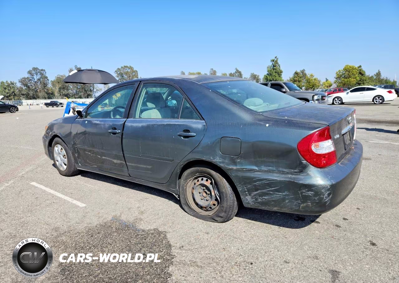 2002 Toyota Camry Le VIN:JTDBE32K720021568 - 2