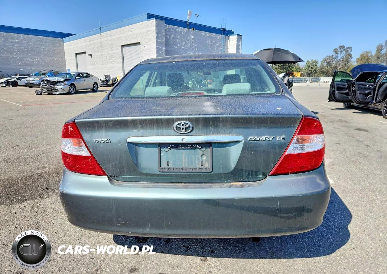 2002 Toyota Camry Le VIN:JTDBE32K720021568 - 6