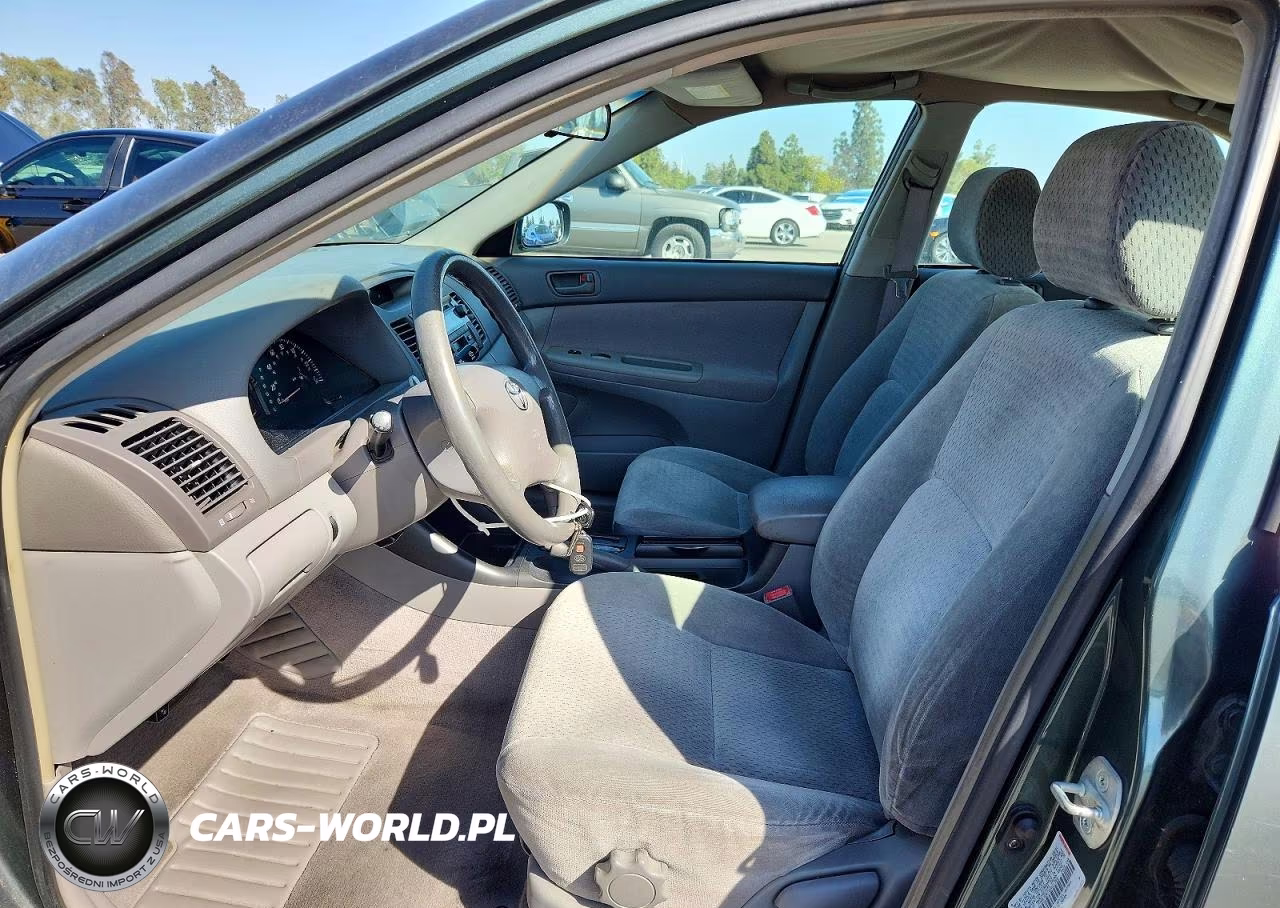 2002 Toyota Camry Le VIN:JTDBE32K720021568 - 7