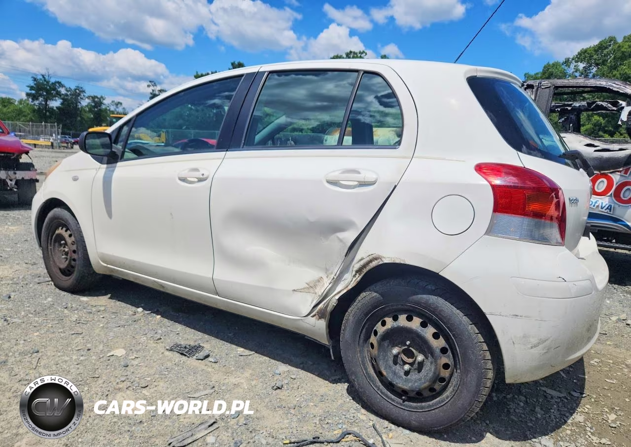 2009 Toyota Yaris Base VIN:JTDKT903695232603 - 2