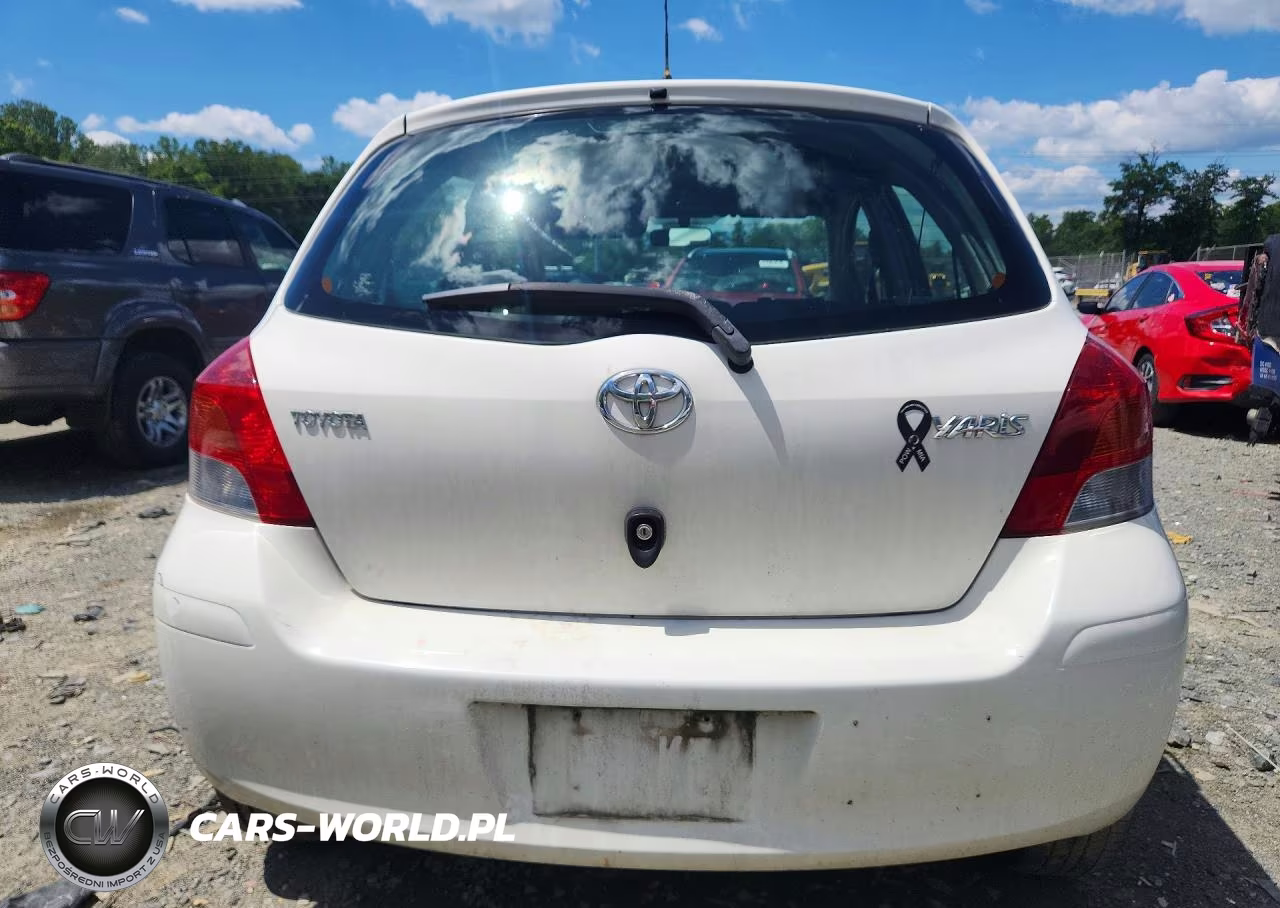 2009 Toyota Yaris Base VIN:JTDKT903695232603 - 6