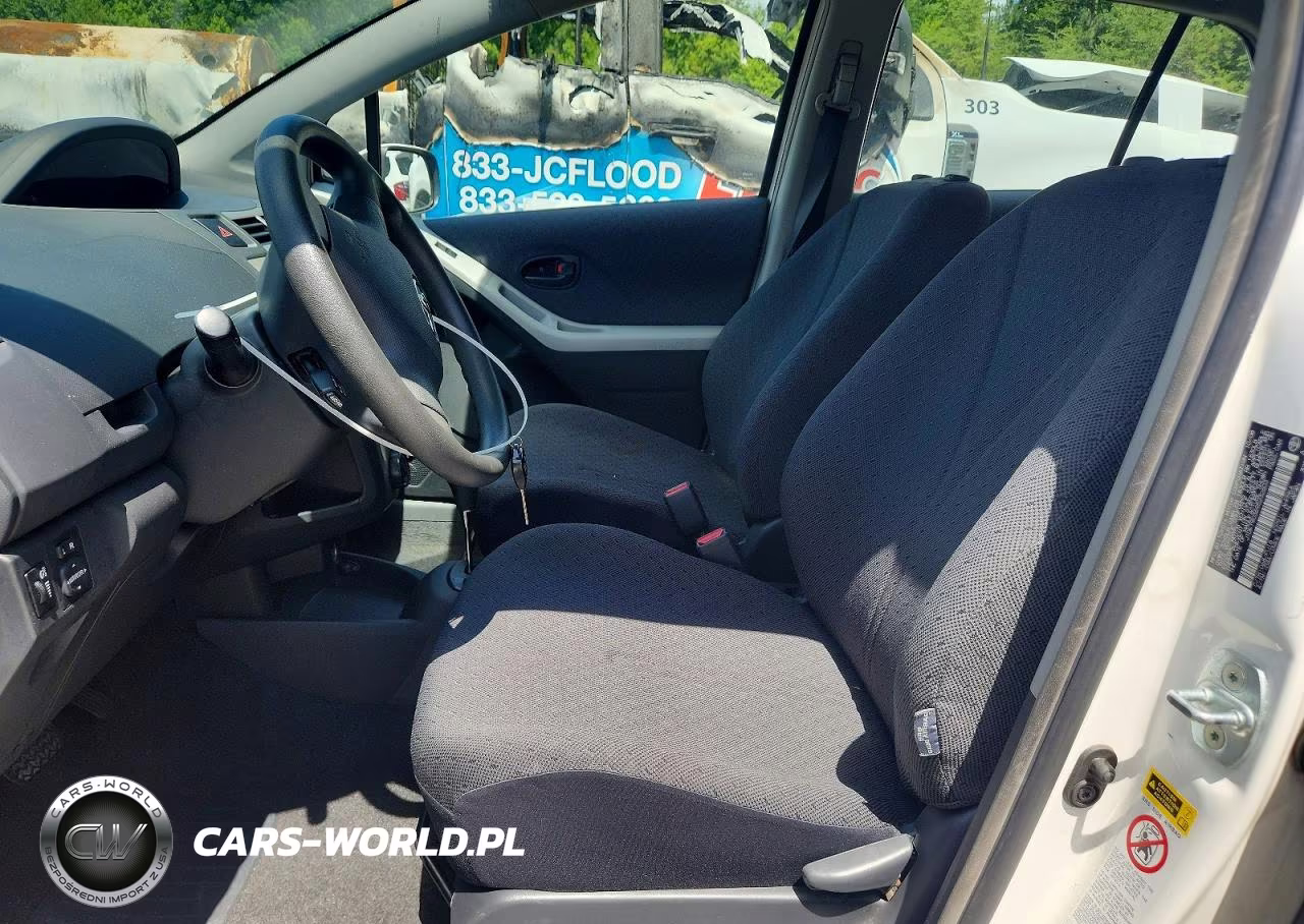 2009 Toyota Yaris Base VIN:JTDKT903695232603 - 7