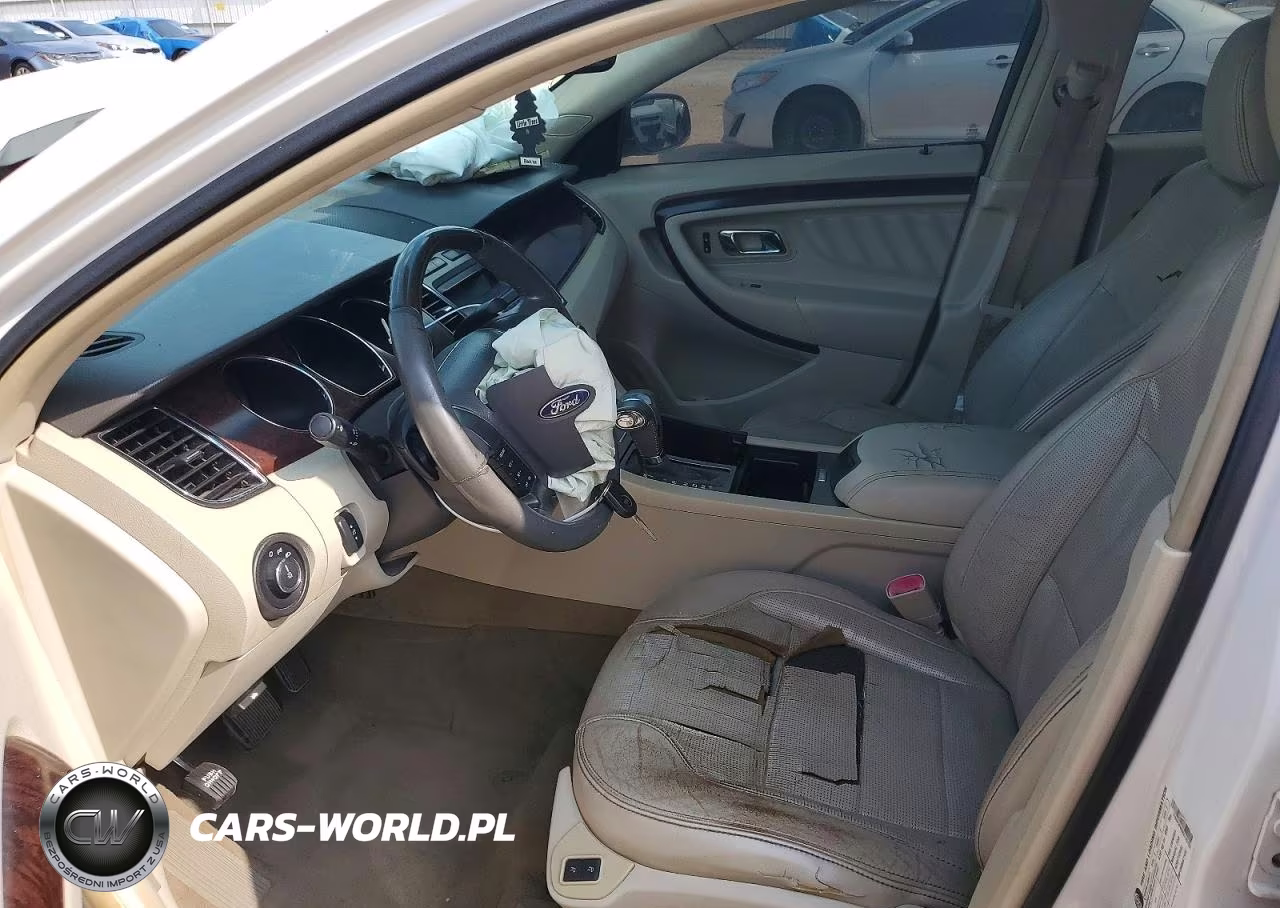 2011 Ford Taurus VIN:1FAHP2FW9BG125729 - 7