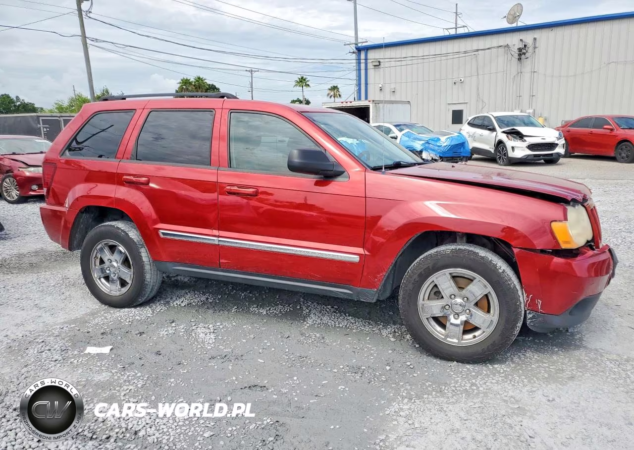 2009 Jeep Grand Cherokee Laredo VIN:1J8GR48K89C556160 - 4