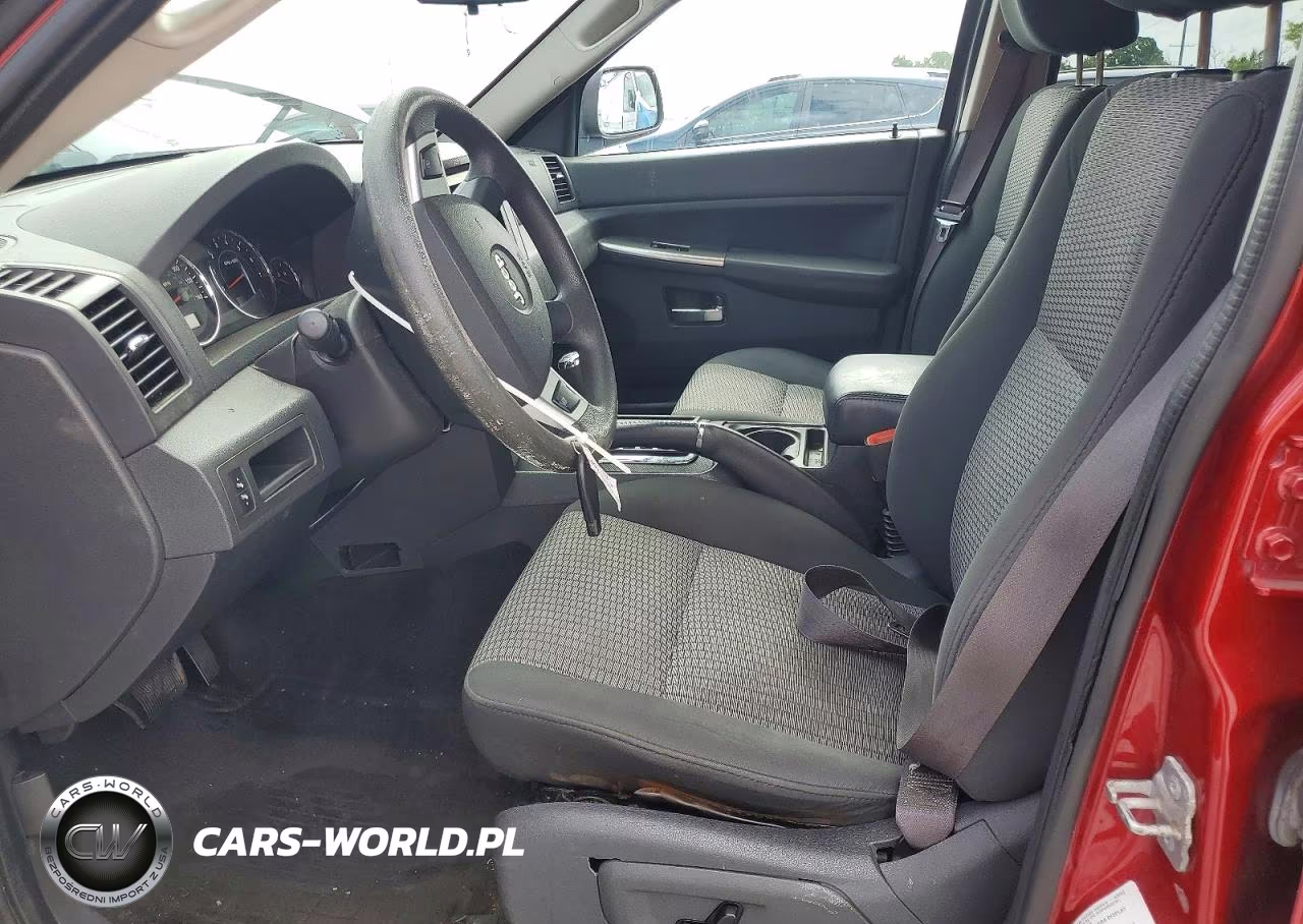 2009 Jeep Grand Cherokee Laredo VIN:1J8GR48K89C556160 - 7