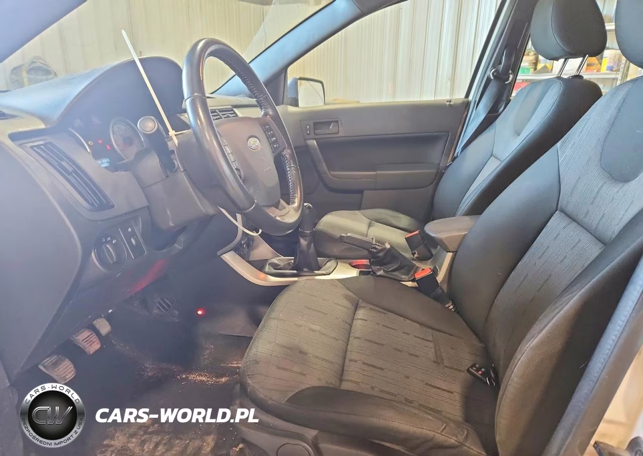 2009 Ford Focus Se VIN:1FAHP35N69W225561 - 7