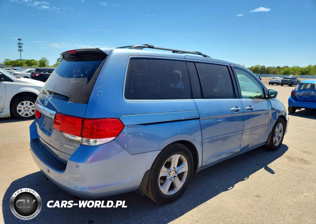 2010 Honda Odyssey Touring VIN:5FNRL3H90AB091017 - 3