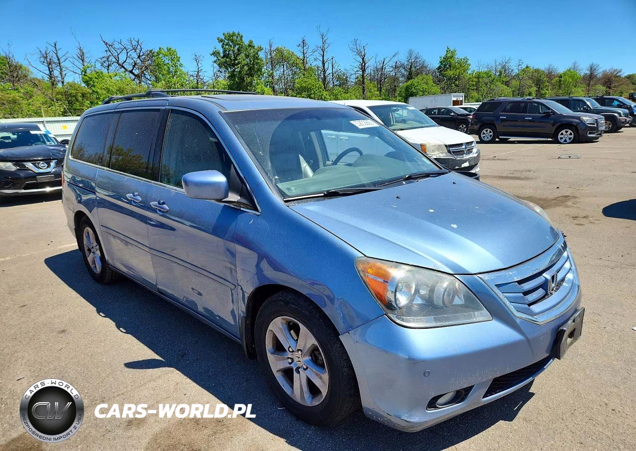 2010 Honda Odyssey Touring VIN:5FNRL3H90AB091017 - 4