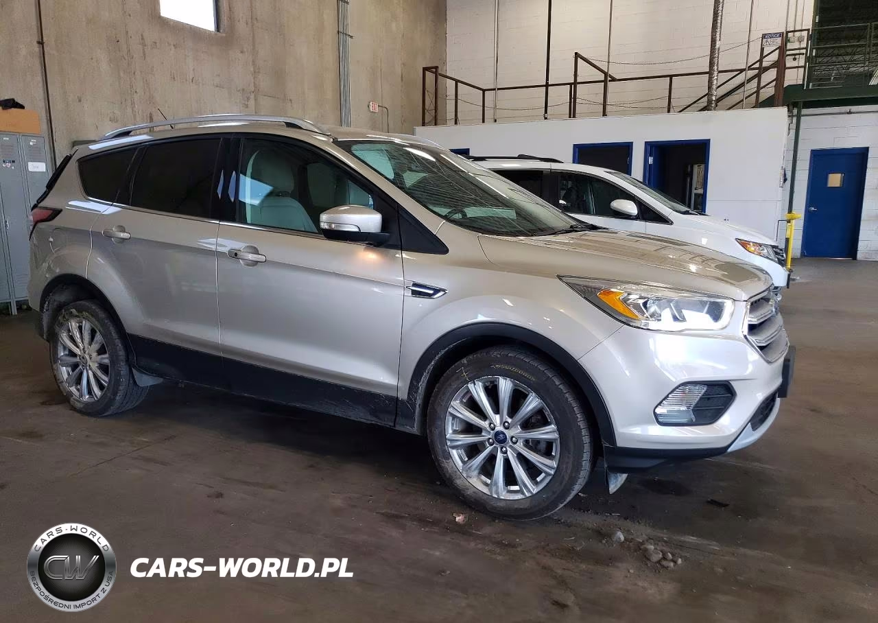 2017 Ford Escape Titanium VIN:1FMCU9J95HUE23840 - 4