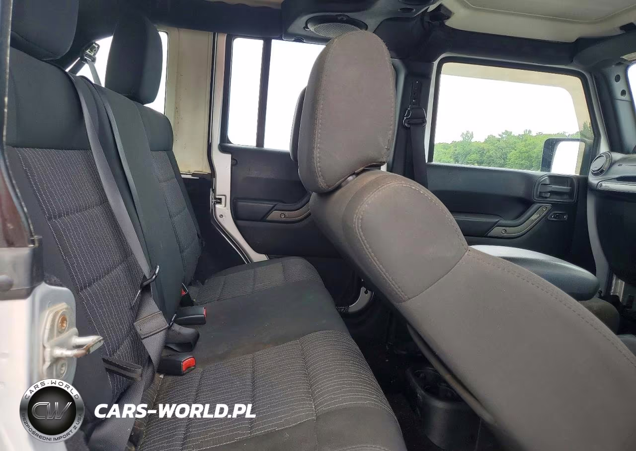 2012 Jeep Wrangler Unlimited Sport VIN:1C4BJWKG5CL242725 - 11