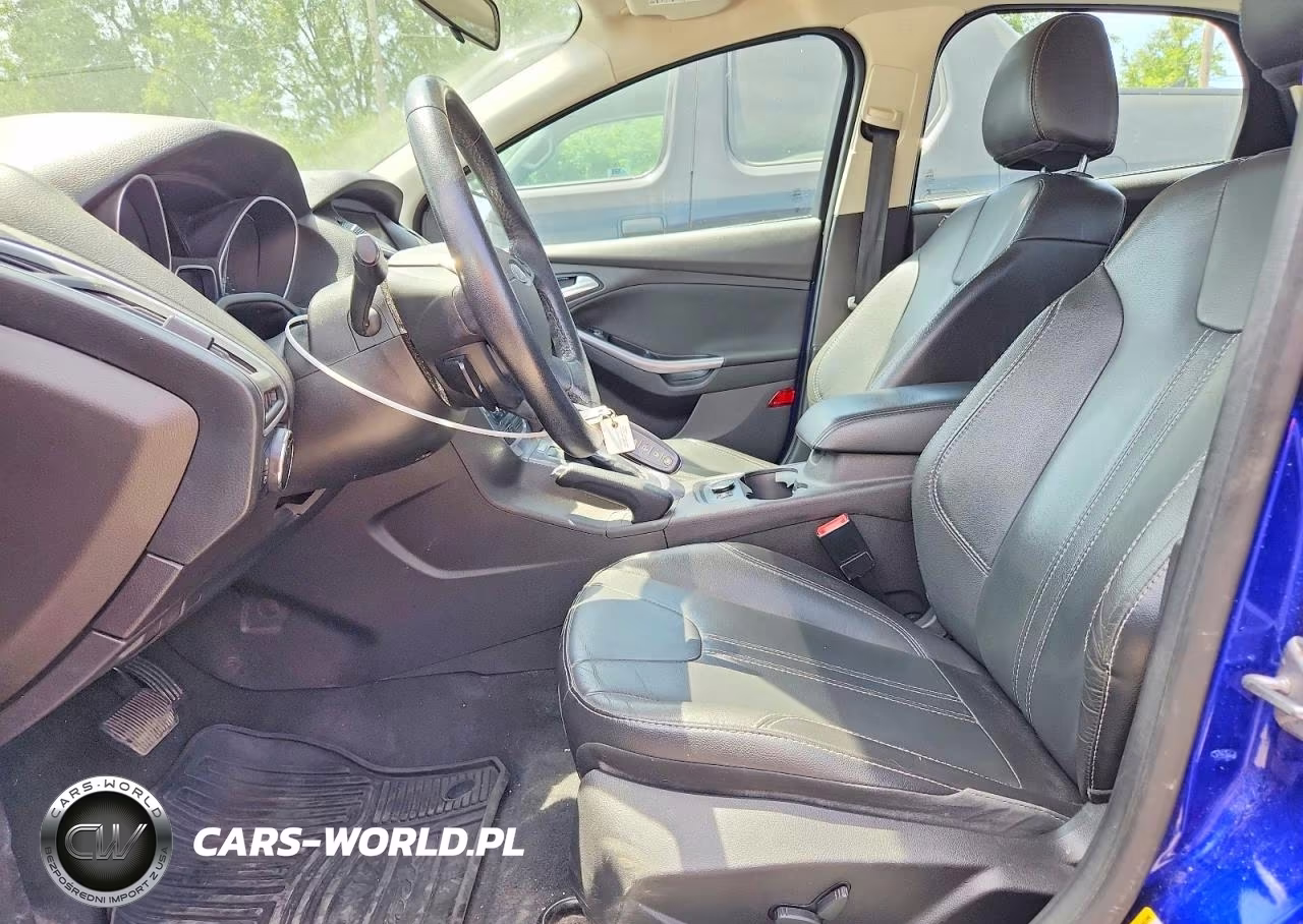 2014 Ford Focus Titanium VIN:1FADP3N28EL253300 - 7