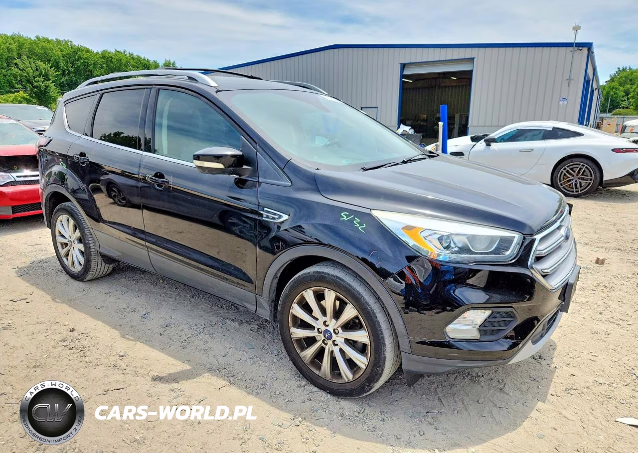 2017 Ford Escape Titanium VIN:1FMCU9JD4HUC44449 - 4