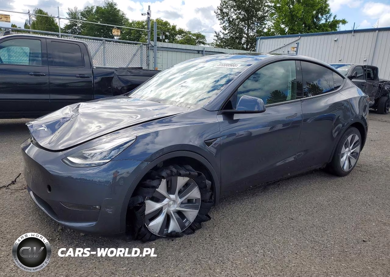 2023 Tesla Model Y VIN:7SAYGAEE0PF596752 - 1