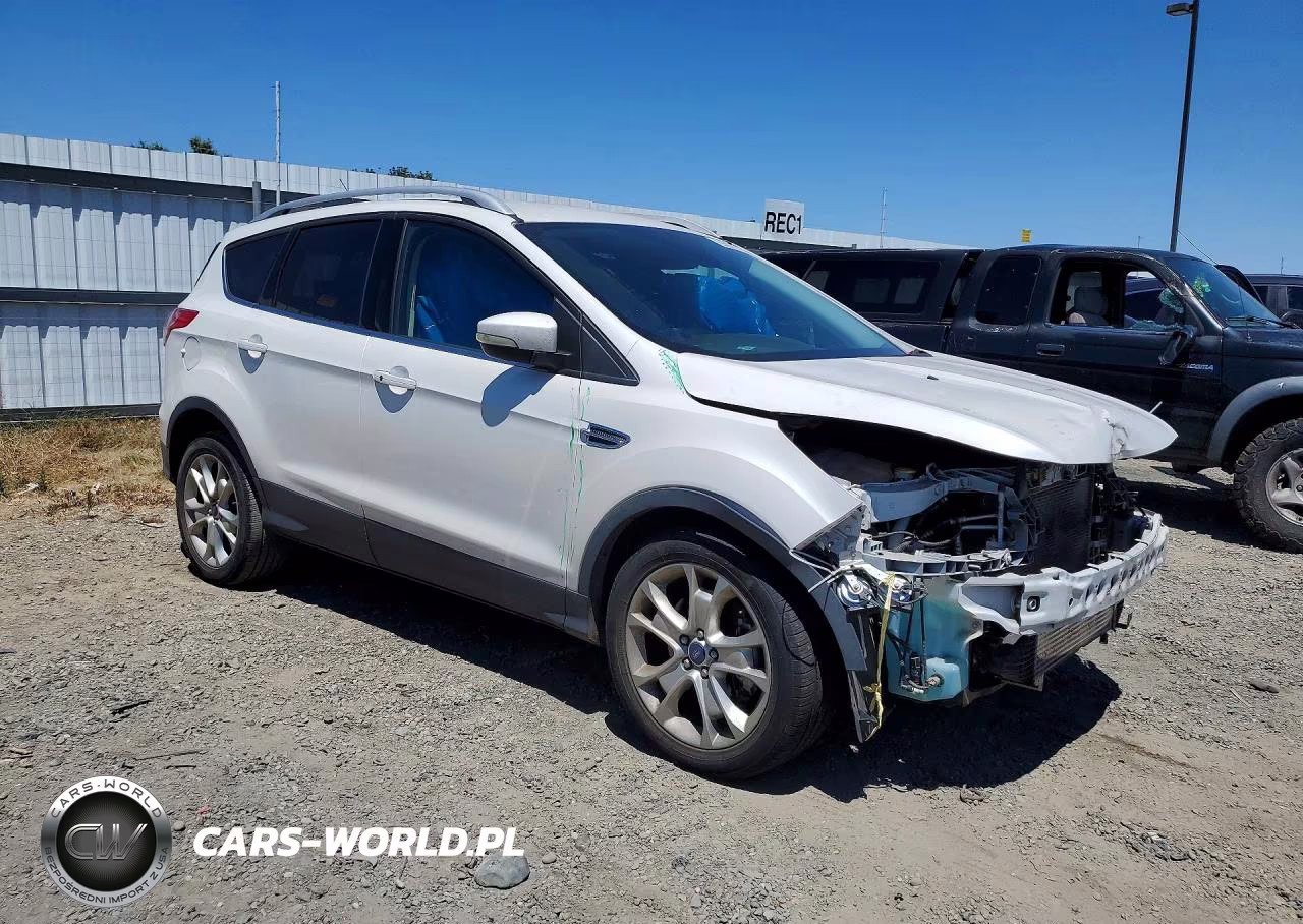 2015 Ford Escape Titanium VIN:1FMCU0J97FUC27083 - 4
