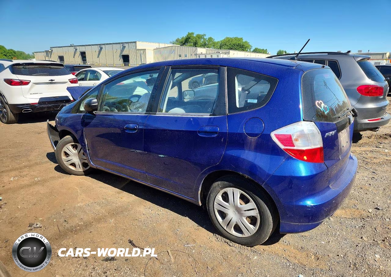 2009 Honda Fit VIN:JHMGE88289S066803 - 2