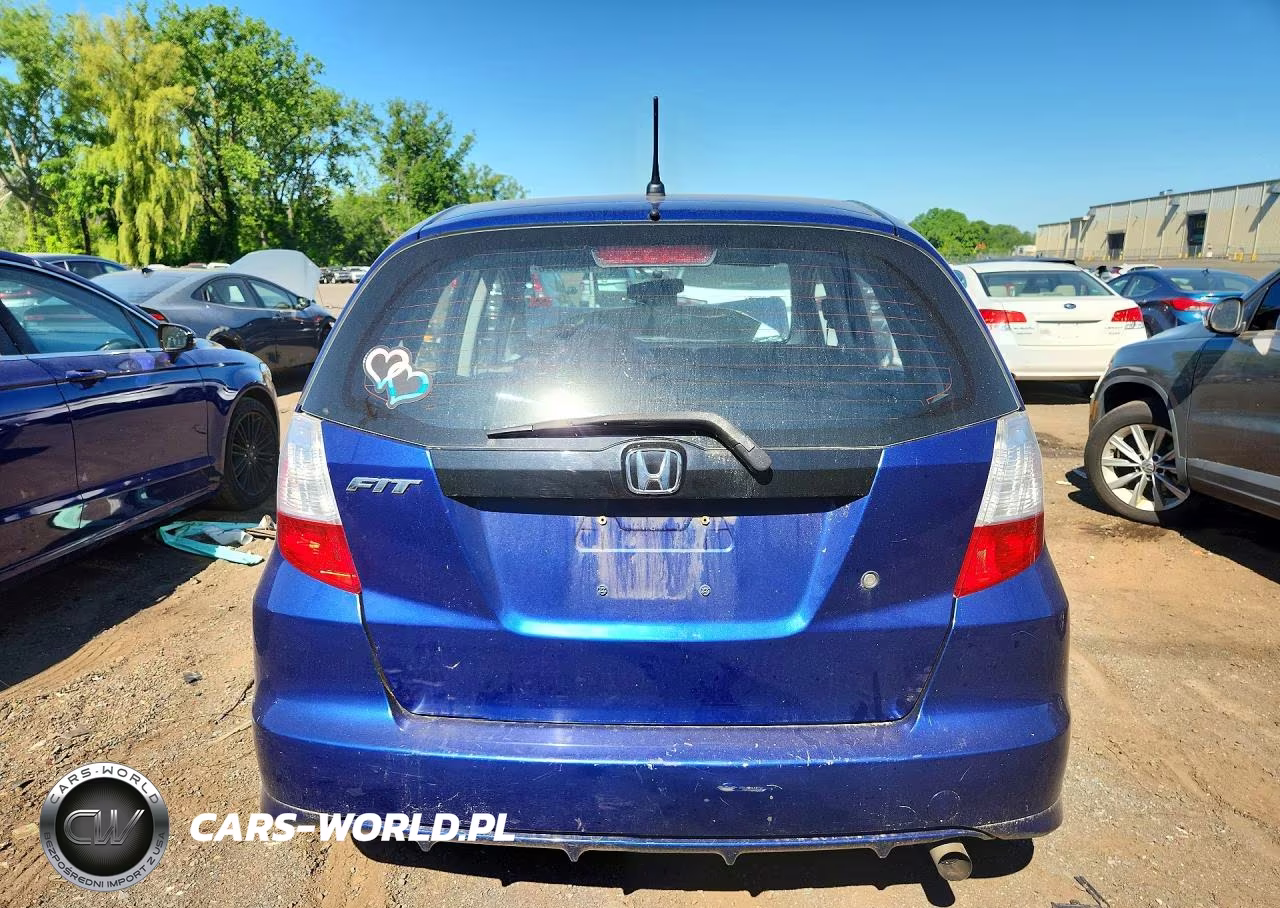 2009 Honda Fit VIN:JHMGE88289S066803 - 6