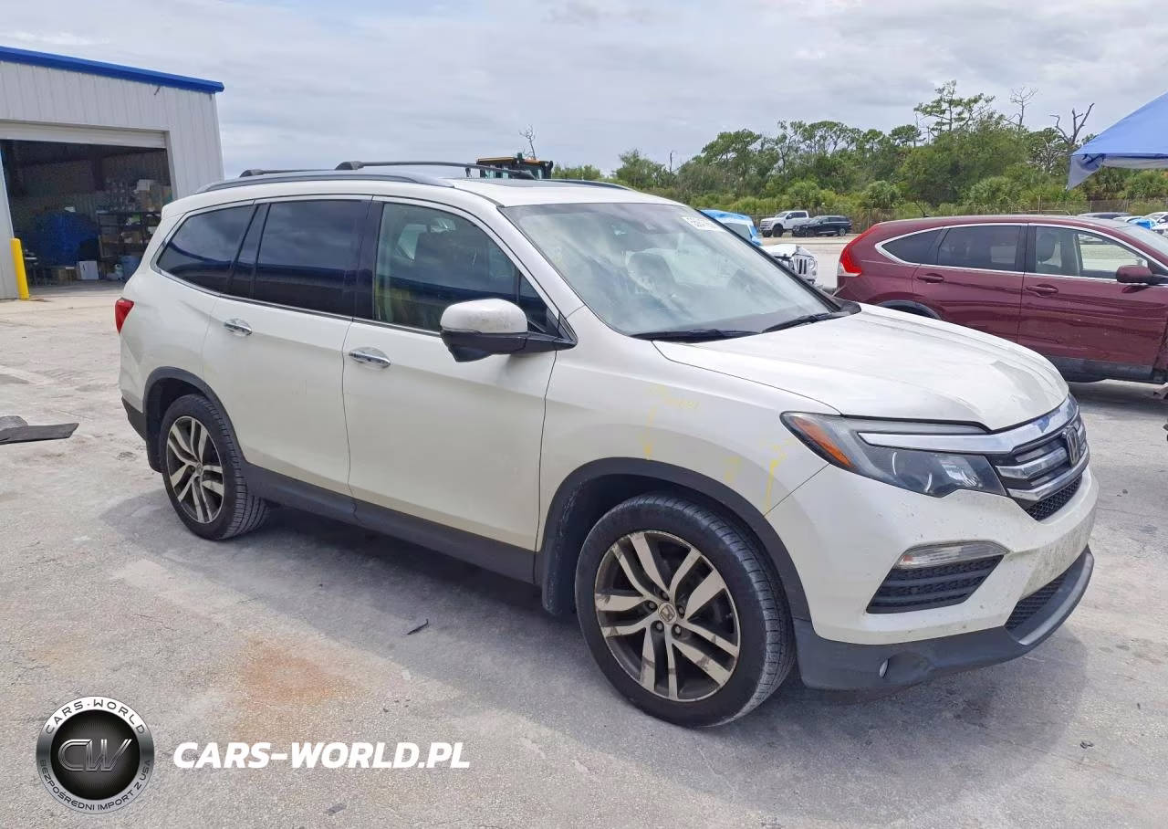 2017 Honda Pilot Touring VIN:5FNYF6H97HB044470 - 4